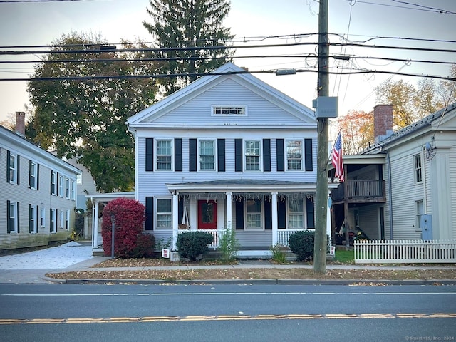 greek revival house with covered porch