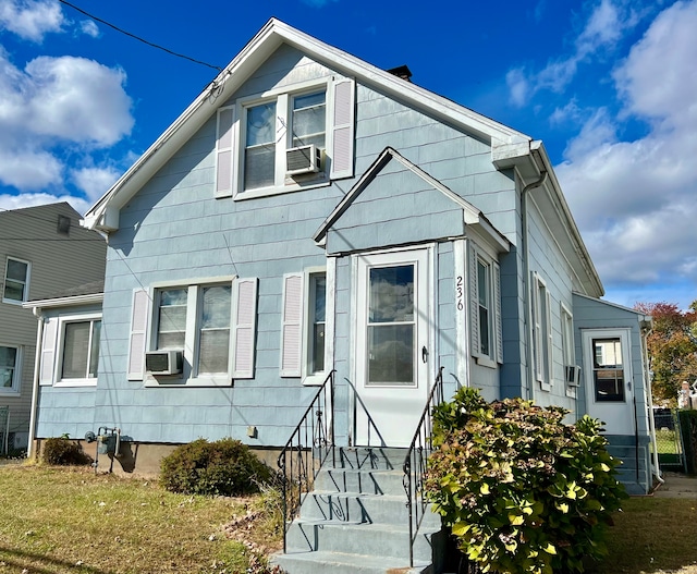 view of front of house with cooling unit