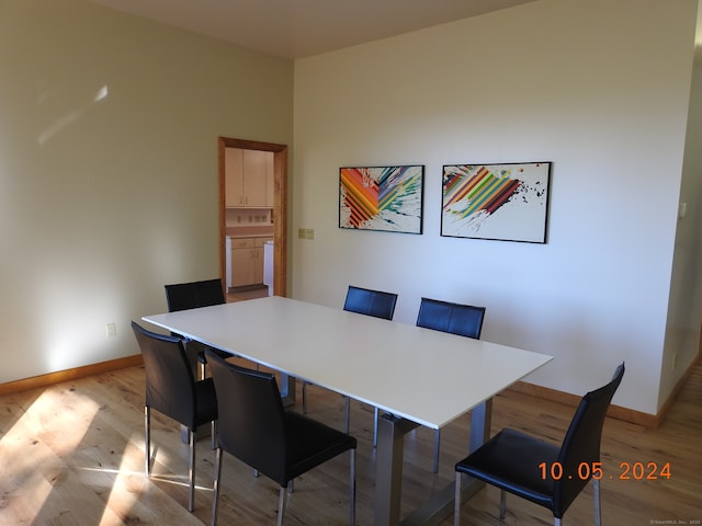 dining room with light hardwood / wood-style floors