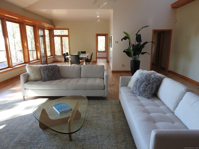 living room with light hardwood / wood-style flooring