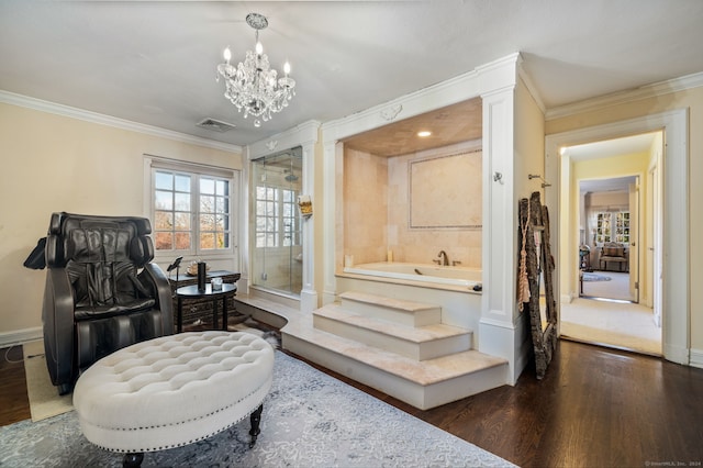 sitting room featuring a notable chandelier, dark hardwood / wood-style flooring, and ornamental molding