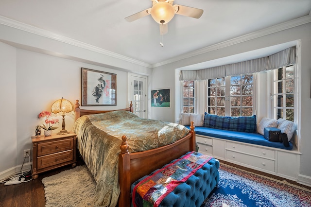 bedroom featuring ceiling fan, dark hardwood / wood-style floors, and ornamental molding