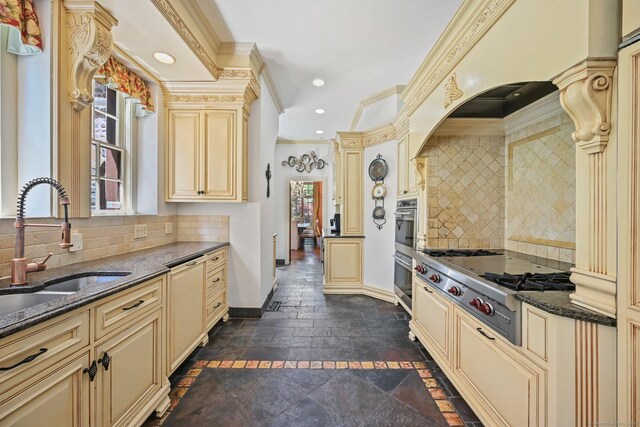 6 Prospect Ct, Hamden, CT 06517 - kitchen with cream cabinets, appliances with stainless steel finishes, ornamental molding, a sink, and stone tile flooring