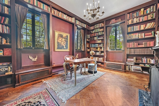 6 Prospect Ct, Hamden, CT 06517 - office space with a chandelier, wall of books, and built in shelves