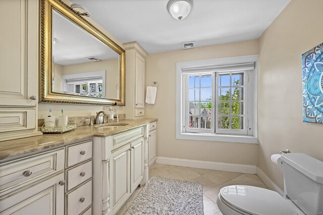 6 Prospect Ct, Hamden, CT 06517 - bathroom with vanity, toilet, baseboards, and tile patterned flooring