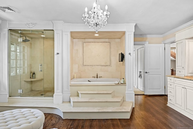 6 Prospect Ct, Hamden, CT 06517 - bathroom featuring a shower stall, a bath, wood finished floors, a chandelier, and ornamental molding