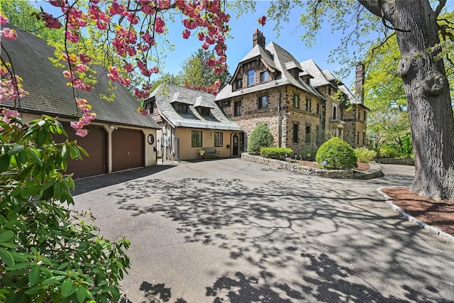 6 Prospect Ct, Hamden, CT 06517 - view of front of house featuring driveway and stucco siding