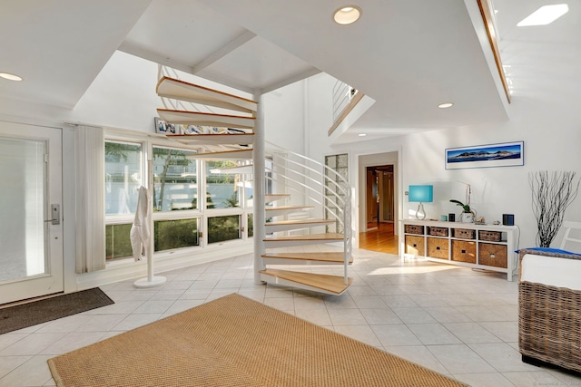 entryway with light tile patterned floors