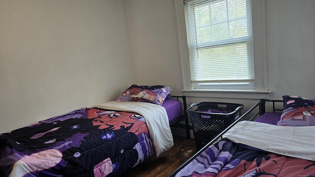 bedroom with multiple windows