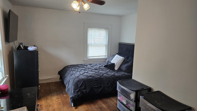 bedroom with wood finished floors
