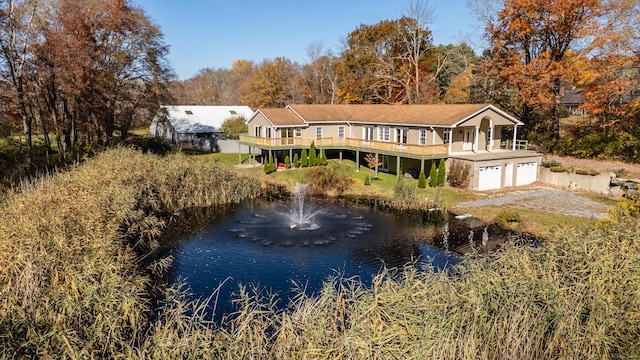 back of house featuring a wooden deck