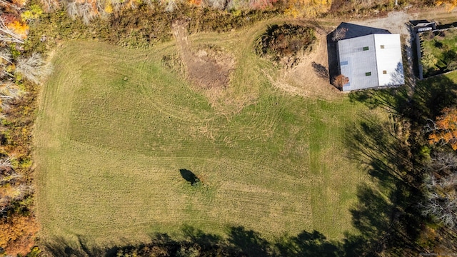 birds eye view of property with a rural view