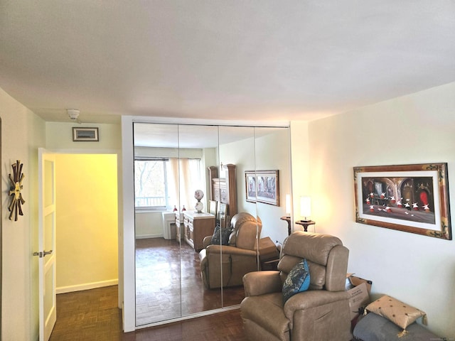 living room with dark parquet floors