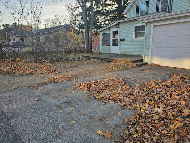 exterior space featuring a garage