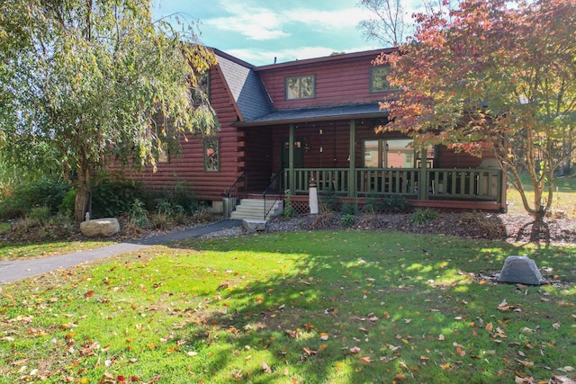 log-style house featuring a front yard and a porch