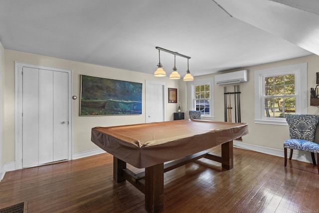 rec room featuring dark hardwood / wood-style floors, pool table, and a wall mounted AC