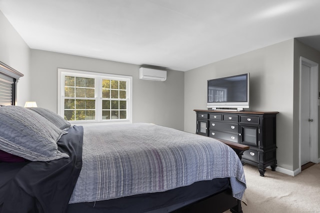 carpeted bedroom featuring a wall mounted air conditioner