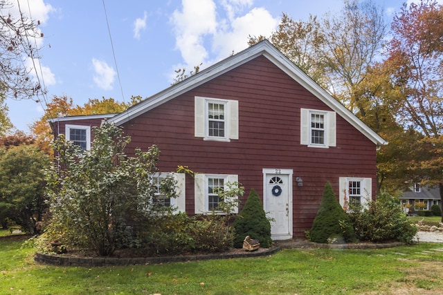 view of front facade with a front lawn