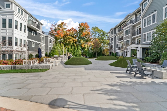 view of home's community featuring a patio area