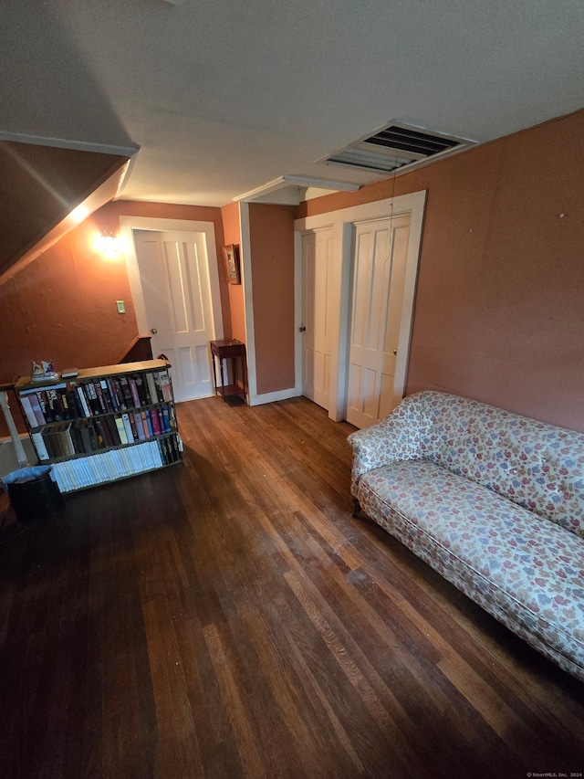 sitting room featuring wood-type flooring