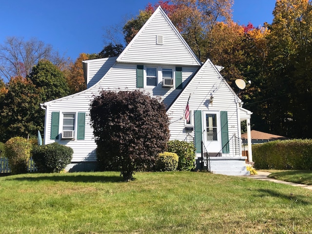 view of front of home with a front yard