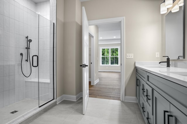 65 Soderman Way Unit 65, Cheshire, CT 06410 - full bathroom with double vanity, a tile shower, baseboards, and tile patterned flooring