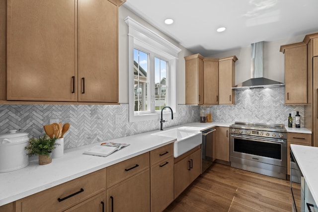 65 Soderman Way Unit 65, Cheshire, CT 06410 - kitchen featuring stainless steel appliances, wall chimney exhaust hood, wood finished floors, decorative backsplash, and recessed lighting