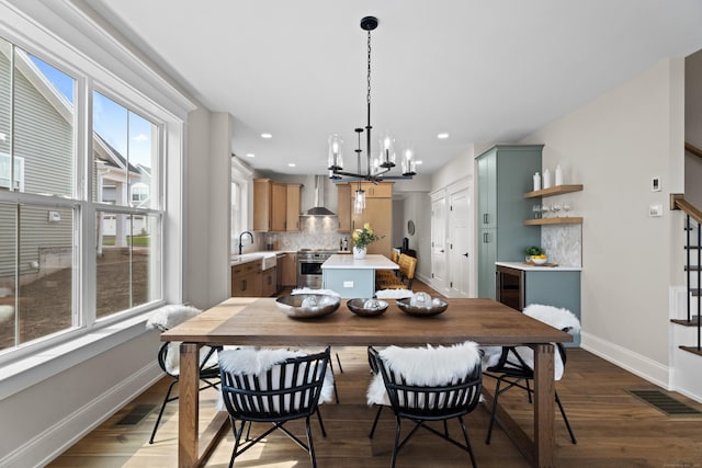 65 Soderman Way Unit 65, Cheshire, CT 06410 - dining area featuring healthy amount of natural light, a chandelier, wine cooler, dark wood-style floors, and recessed lighting