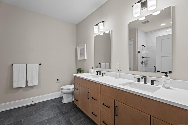 65 Soderman Way Unit 65, Cheshire, CT 06410 - bathroom featuring double vanity and tiled shower