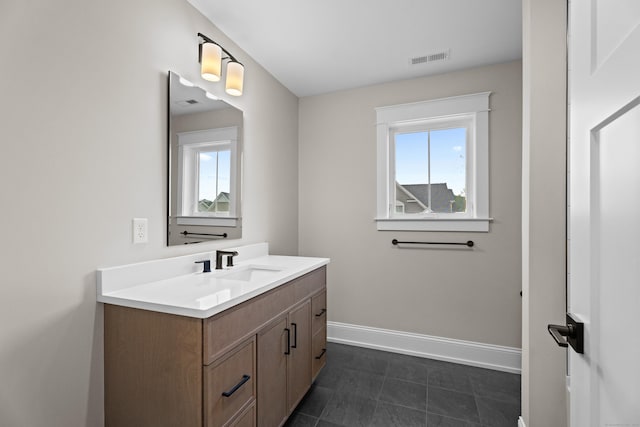 65 Soderman Way Unit 65, Cheshire, CT 06410 - bathroom featuring vanity and plenty of natural light