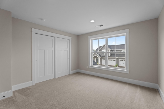 65 Soderman Way Unit 65, Cheshire, CT 06410 - unfurnished bedroom featuring carpet flooring and a closet