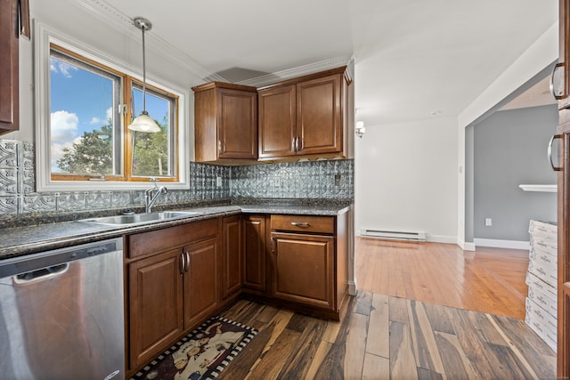 kitchen featuring decorative backsplash, dishwasher, dark wood-type flooring, baseboard heating, and sink