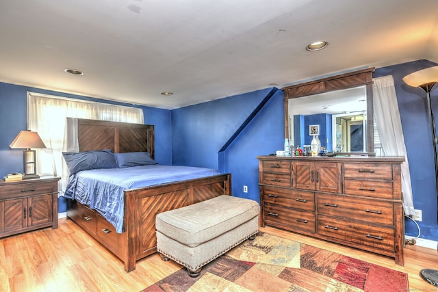 bedroom with light wood-type flooring