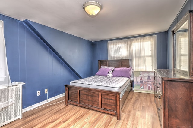 bedroom featuring light hardwood / wood-style floors