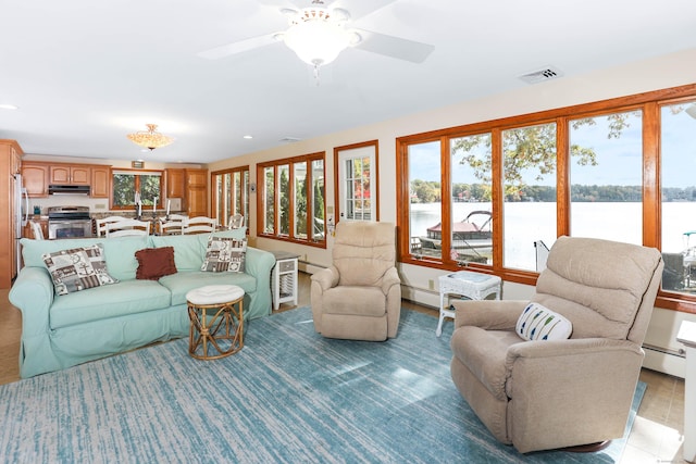 199 Pine Hollow Rd, Killingly, CT 06241 - living room with a baseboard radiator, a water view, a ceiling fan, and recessed lighting