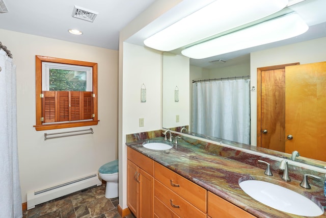 199 Pine Hollow Rd, Killingly, CT 06241 - full bath with a baseboard radiator, double vanity, stone finish flooring, and recessed lighting
