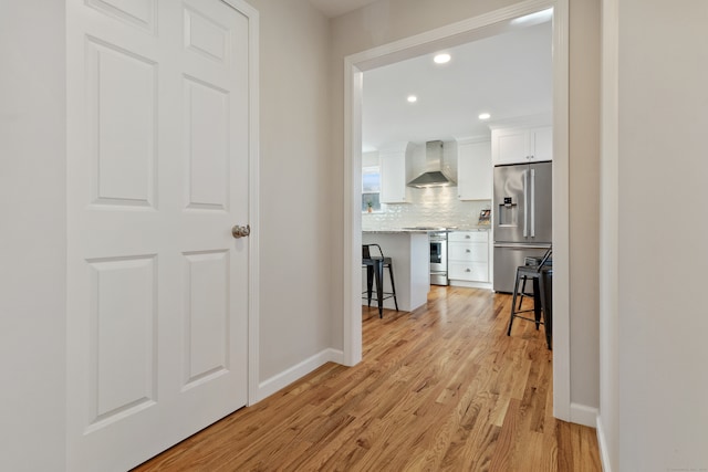 hall featuring light hardwood / wood-style flooring