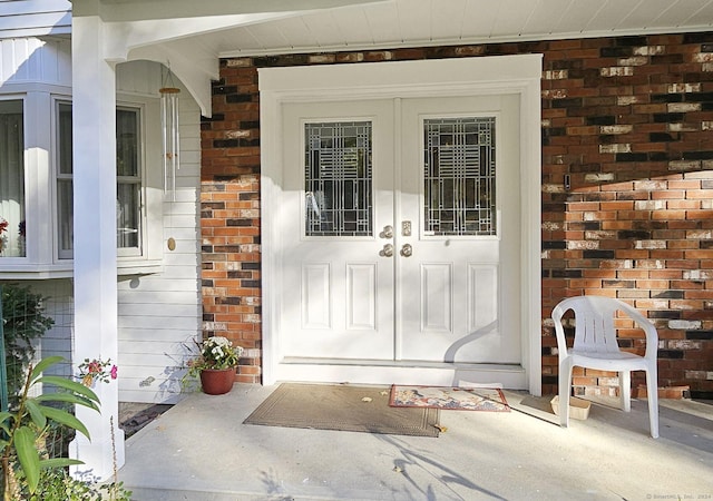 doorway to property featuring french doors