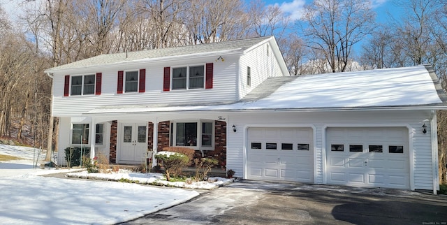 view of front of property featuring a garage