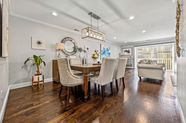 dining area featuring ornamental molding and dark wood-type flooring