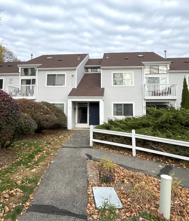 view of front of house with a balcony