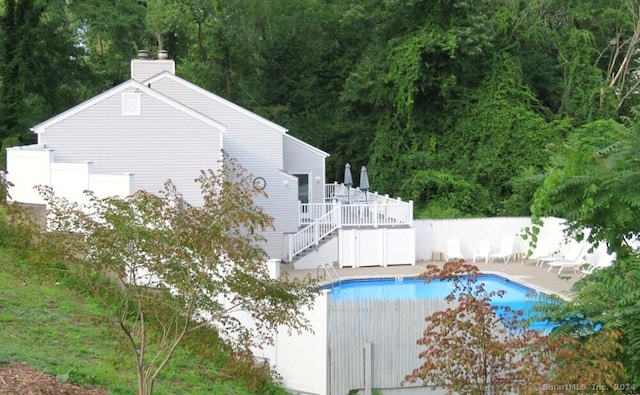 view of pool with a deck