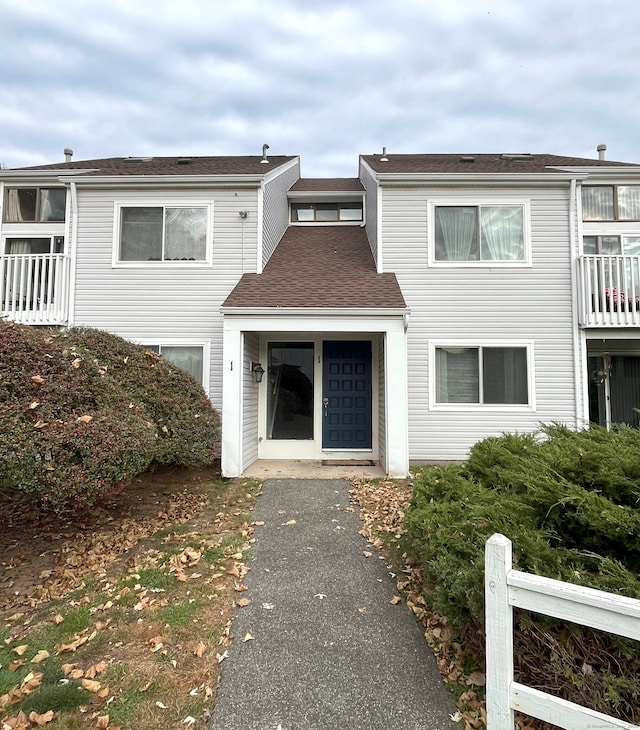 view of front of home with a balcony