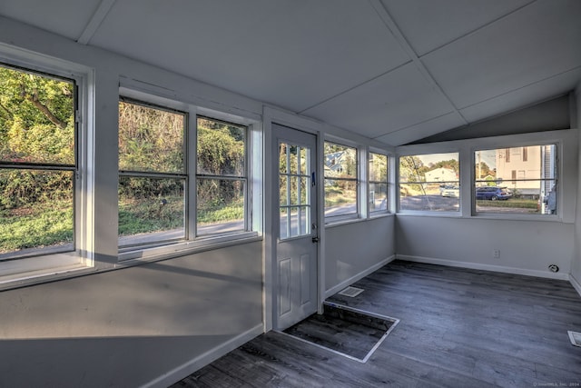 unfurnished sunroom with vaulted ceiling