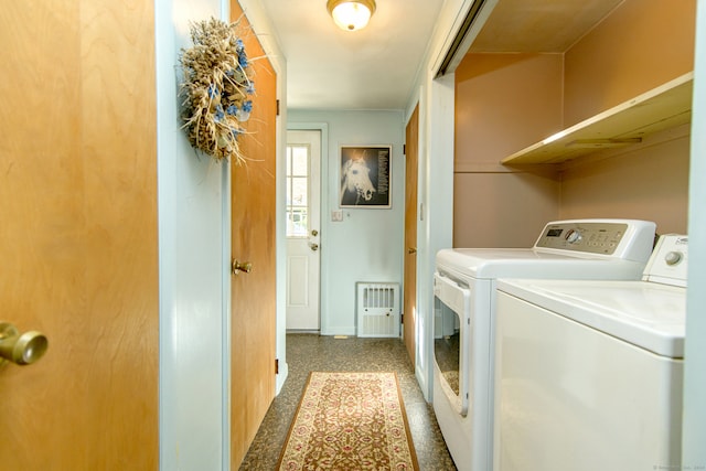 laundry room with washing machine and dryer