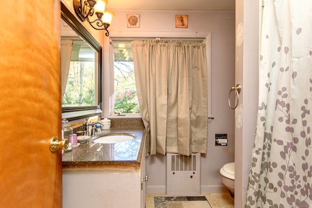 bathroom with vanity and toilet