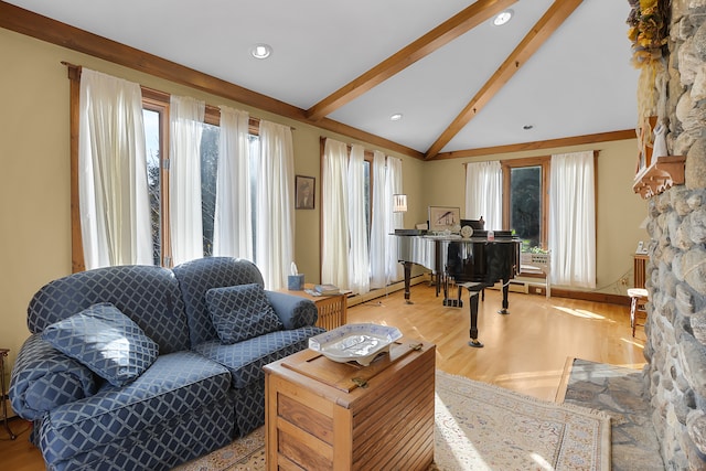 living room with vaulted ceiling with beams and light wood-type flooring