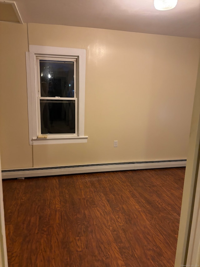 unfurnished room featuring wood-type flooring