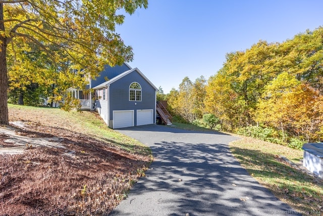 view of home's exterior with a garage