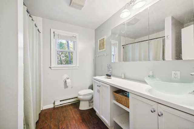 bathroom featuring a baseboard radiator, walk in shower, wood-type flooring, toilet, and vanity